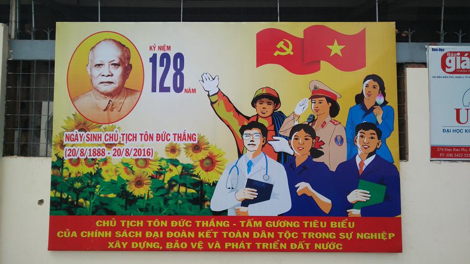 Communist poster in the street of Saigon