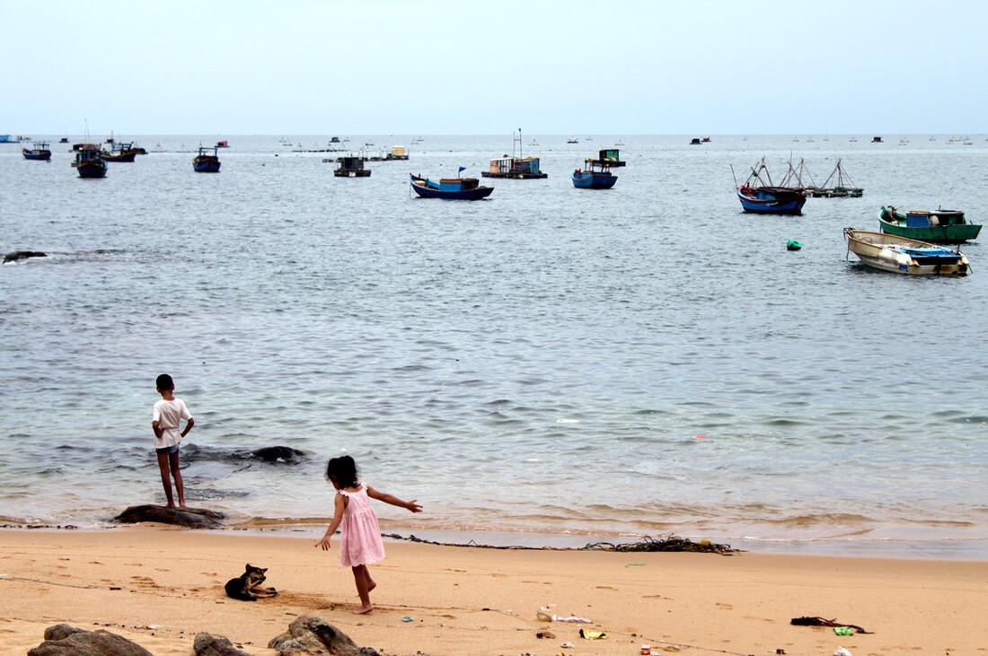 Local kids playing on the beach