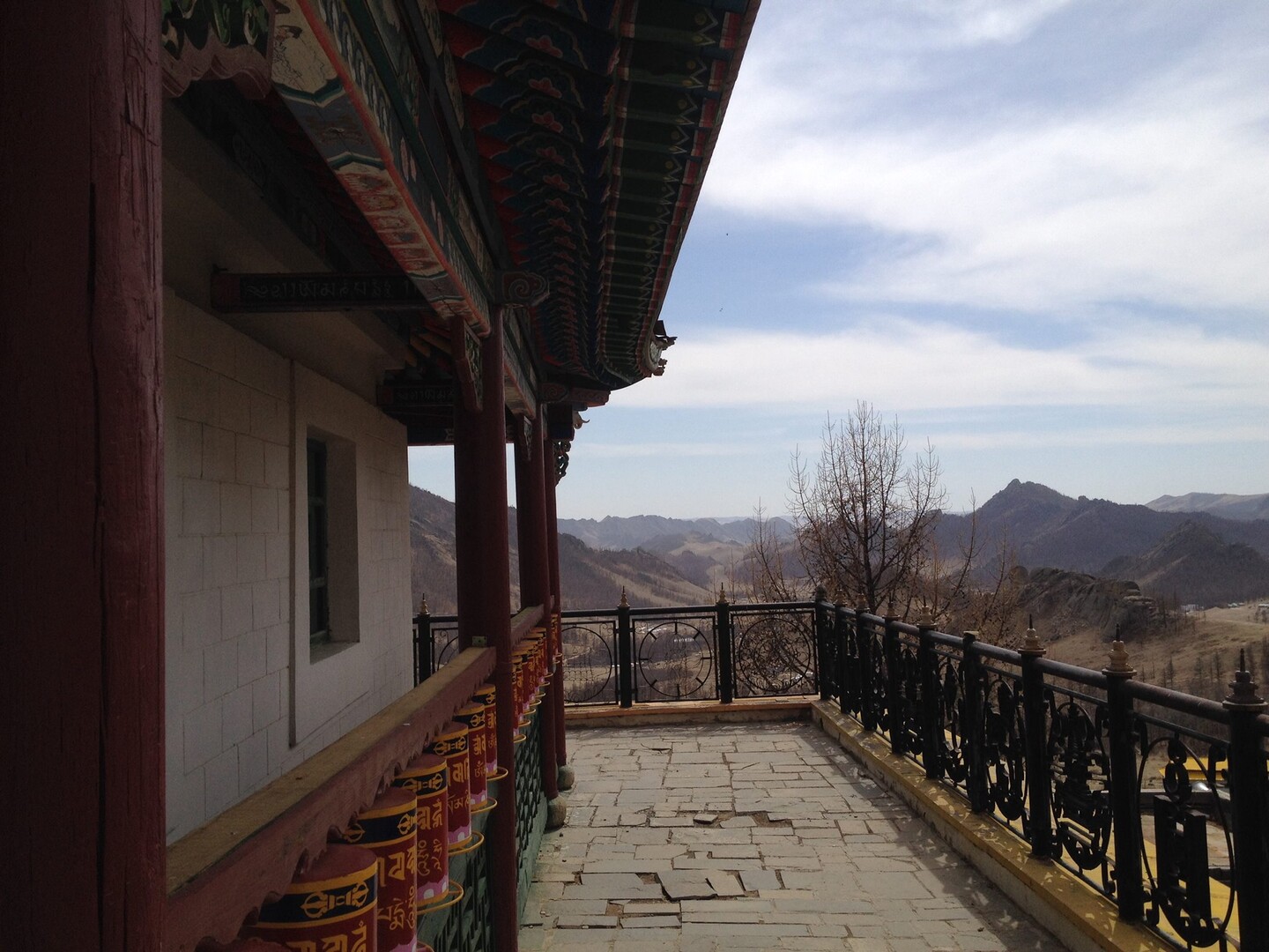 A mongolian buddhist temple overlooking the mountains