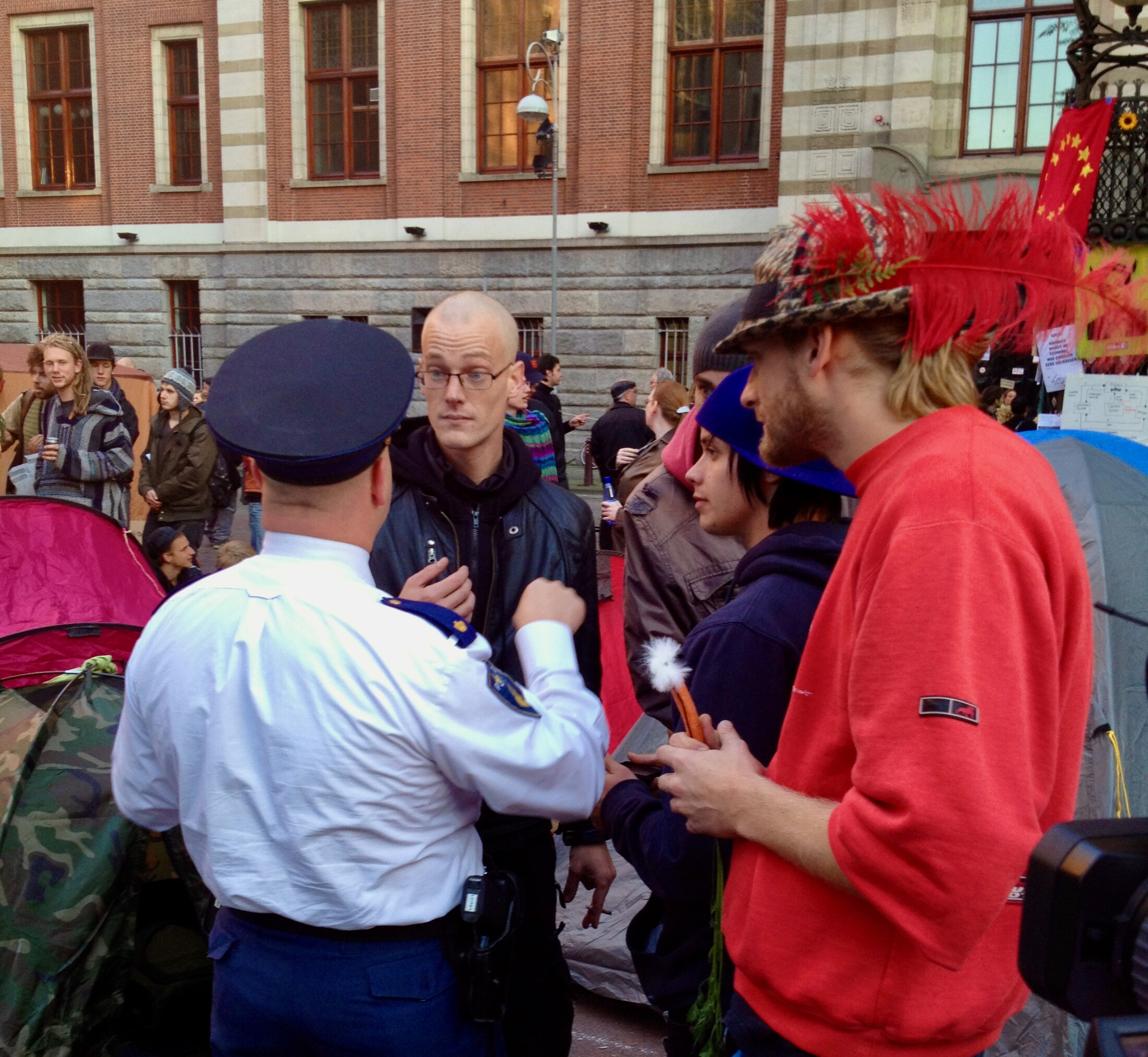 Police chatting with protesters at Occupy Amsterdam