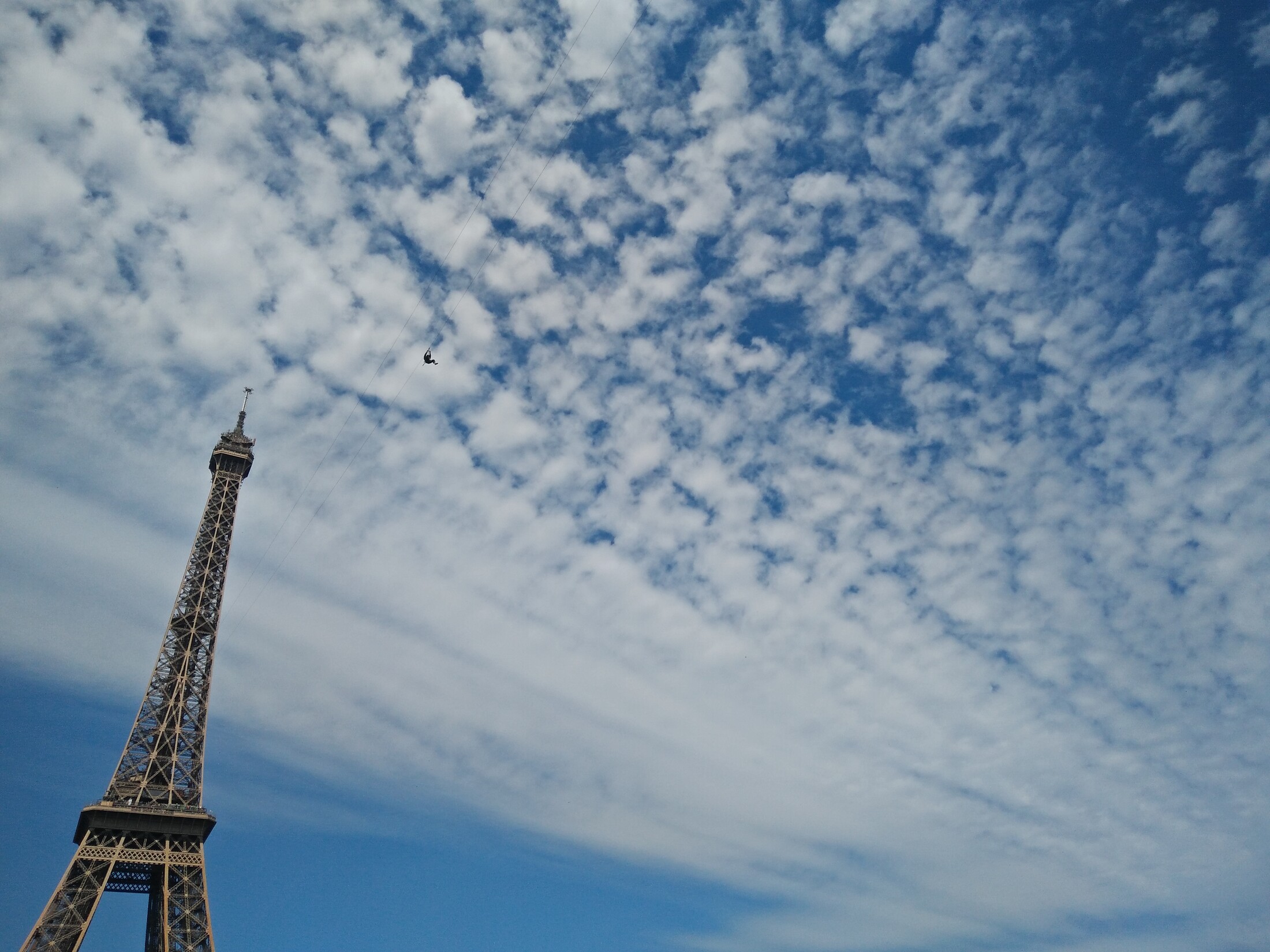 Someone abseiling of the eiffel tower